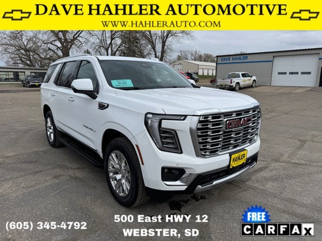 2025 GMC Yukon Denali in Summit White — front three-quarter view