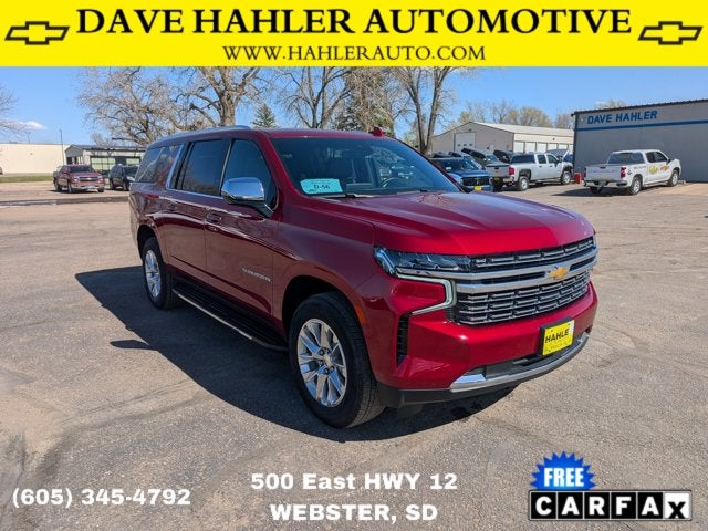 2024 Chevrolet Suburban Premier in Radiant Red Tintcoat — front three-quarter view