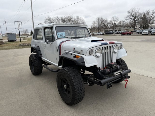 1970 Jeep Commando Hurst in White — front three-quarter view